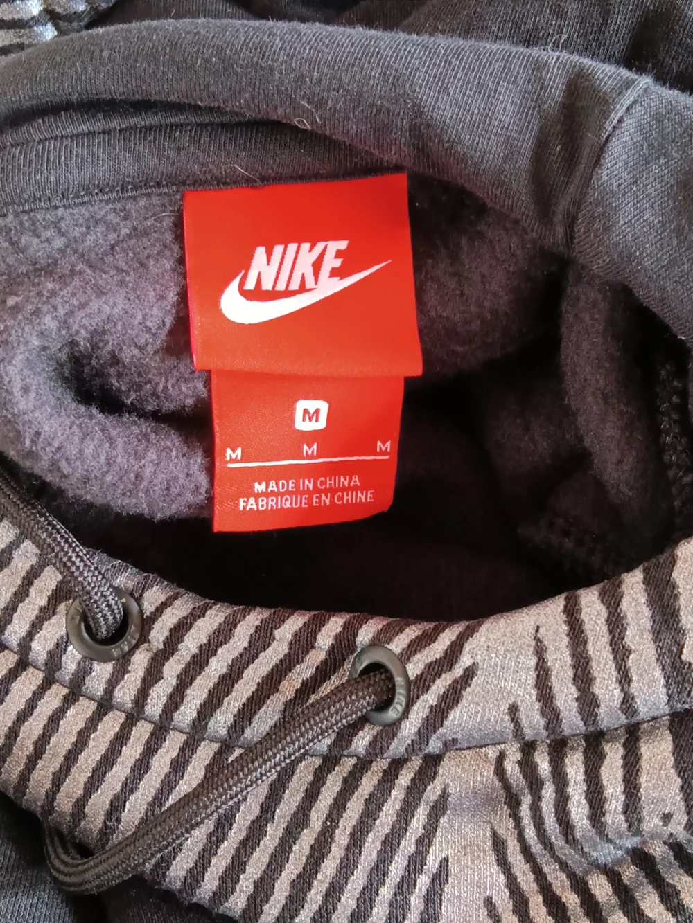 Nike Black Pullover Hoodie with Red Logo